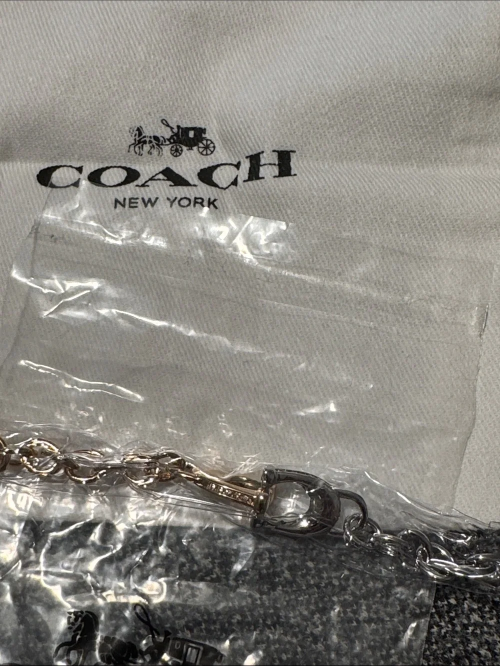 Gold and silver Coach bracelet
